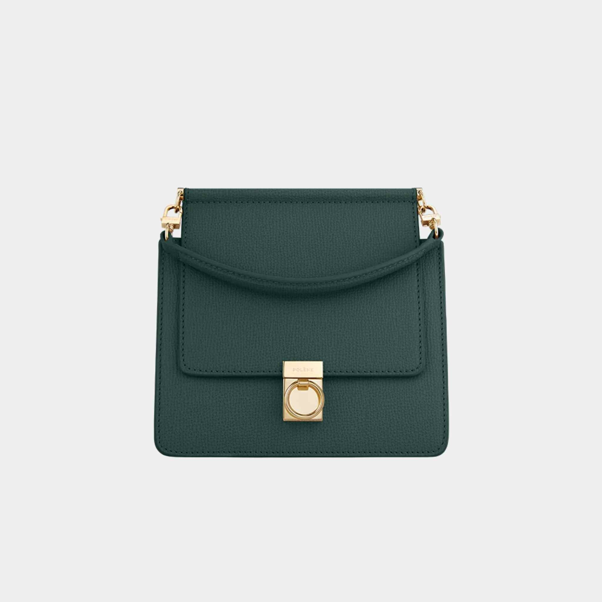 Green structured leather shoulder bag used as an example for bag inspection